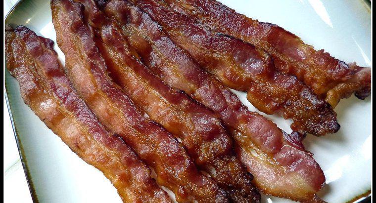 Combien y a-t-il de grammes de protéines dans le bacon ?